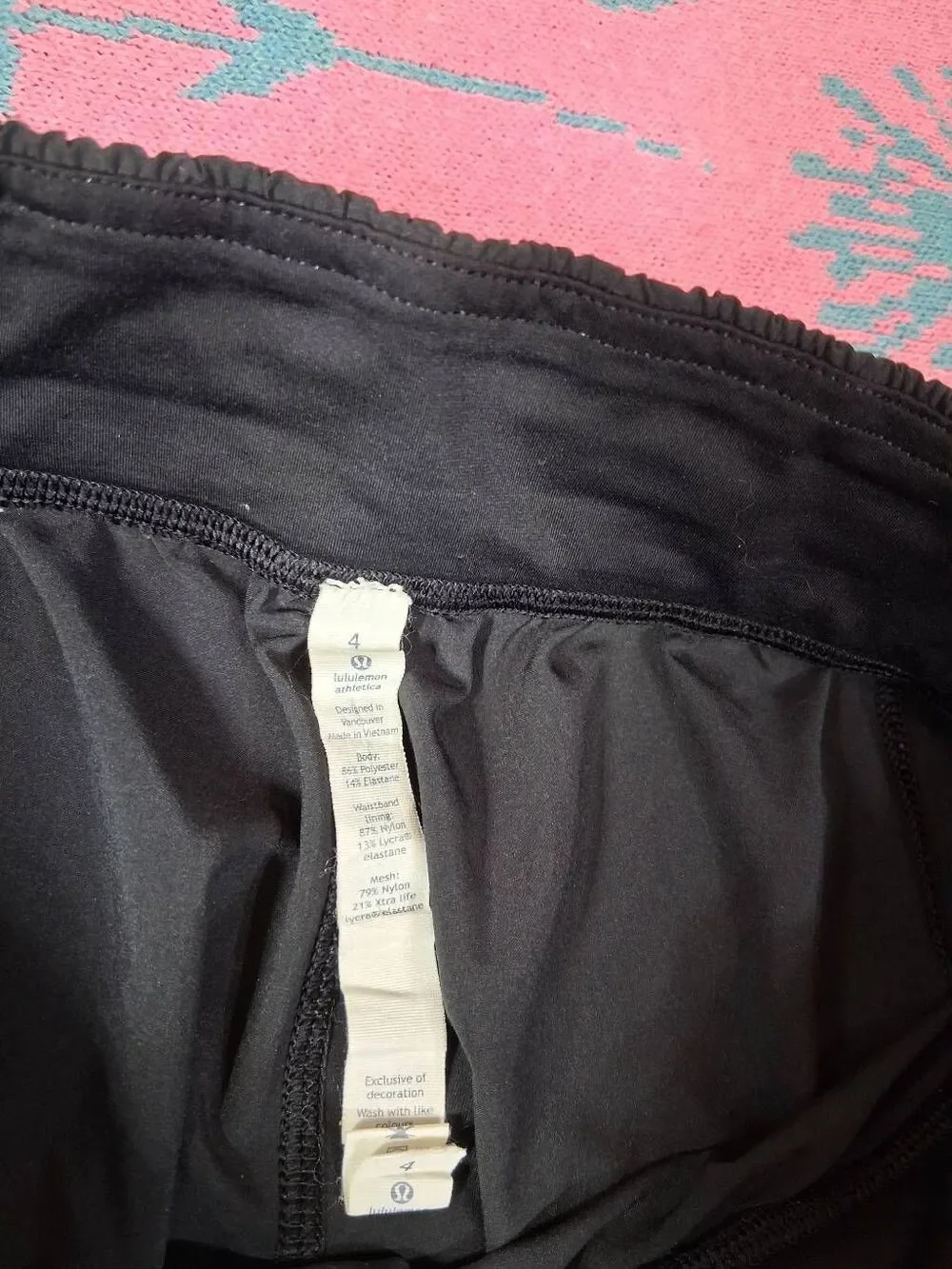 Lululemon womens size 4 mesh hem black running shorts gym Activewear athletic